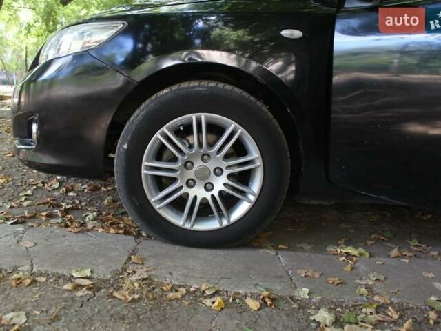 Черный Тойота Королла, объемом двигателя 1.6 л и пробегом 250 тыс. км за 5000 $, фото 2 на Automoto.ua