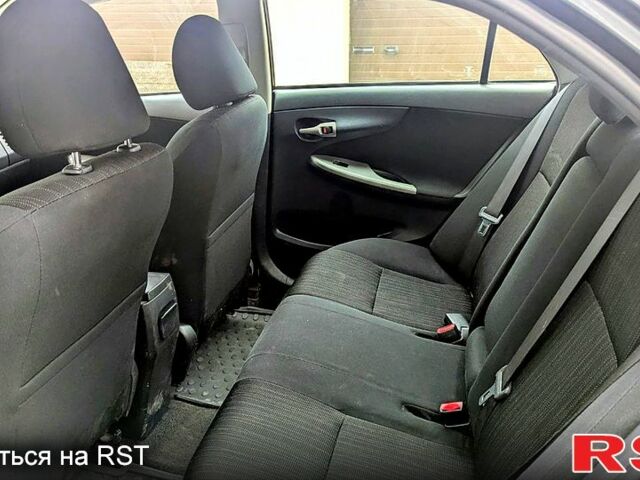 Чорний Тойота Королла, об'ємом двигуна 1.6 л та пробігом 197 тис. км за 6000 $, фото 11 на Automoto.ua