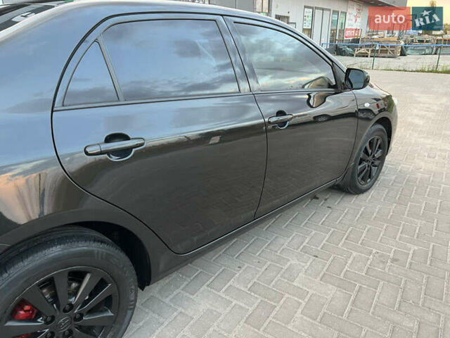 Черный Тойота Королла, объемом двигателя 1.6 л и пробегом 199 тыс. км за 7950 $, фото 22 на Automoto.ua