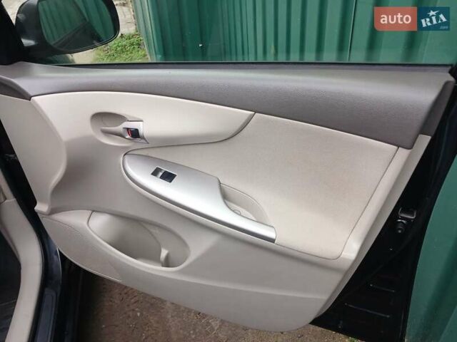 Чорний Тойота Королла, об'ємом двигуна 1.6 л та пробігом 132 тис. км за 7985 $, фото 23 на Automoto.ua