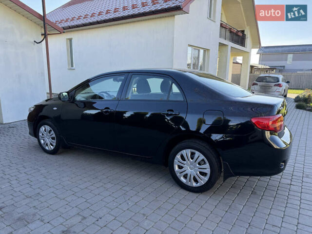 Черный Тойота Королла, объемом двигателя 1.6 л и пробегом 147 тыс. км за 6999 $, фото 6 на Automoto.ua
