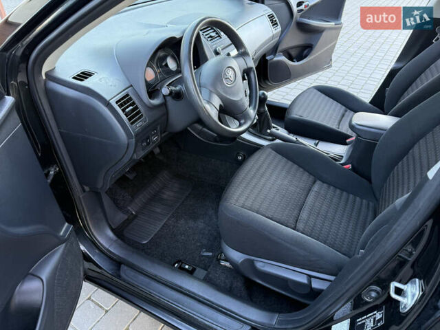 Черный Тойота Королла, объемом двигателя 1.6 л и пробегом 147 тыс. км за 6999 $, фото 42 на Automoto.ua