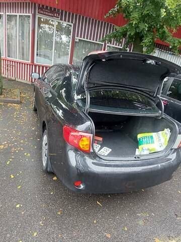 Черный Тойота Королла, объемом двигателя 1.6 л и пробегом 229 тыс. км за 6100 $, фото 1 на Automoto.ua