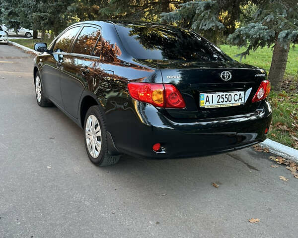 Черный Тойота Королла, объемом двигателя 1.6 л и пробегом 42 тыс. км за 10300 $, фото 9 на Automoto.ua