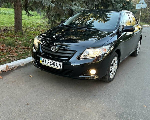 Черный Тойота Королла, объемом двигателя 1.6 л и пробегом 42 тыс. км за 10300 $, фото 1 на Automoto.ua