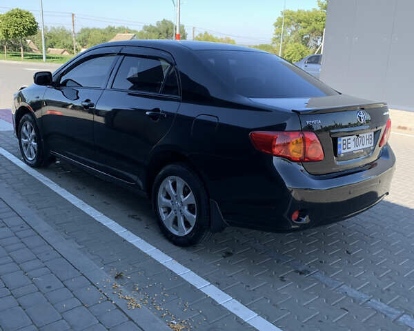 Чорний Тойота Королла, об'ємом двигуна 1.6 л та пробігом 223 тис. км за 7000 $, фото 4 на Automoto.ua