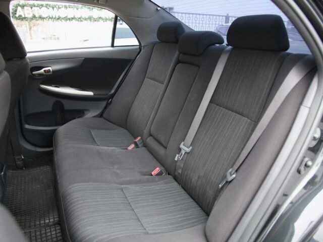 Чорний Тойота Королла, об'ємом двигуна 1.6 л та пробігом 272 тис. км за 6200 $, фото 7 на Automoto.ua