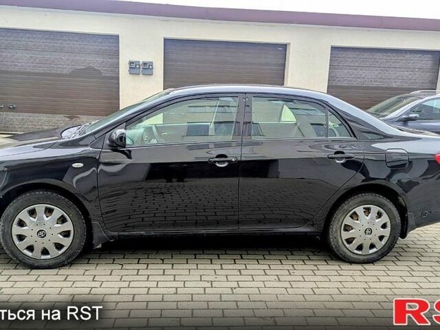 Чорний Тойота Королла, об'ємом двигуна 1.6 л та пробігом 197 тис. км за 6000 $, фото 2 на Automoto.ua