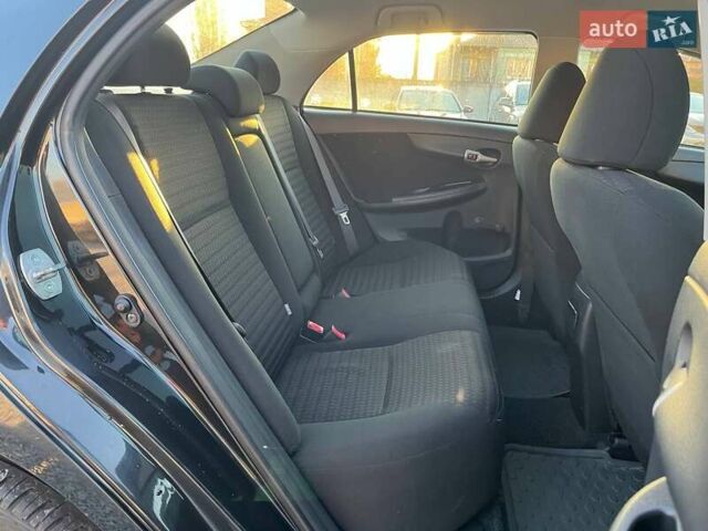 Черный Тойота Королла, объемом двигателя 1.6 л и пробегом 186 тыс. км за 7490 $, фото 9 на Automoto.ua