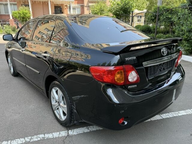 Чорний Тойота Королла, об'ємом двигуна 1.8 л та пробігом 191 тис. км за 7599 $, фото 7 на Automoto.ua