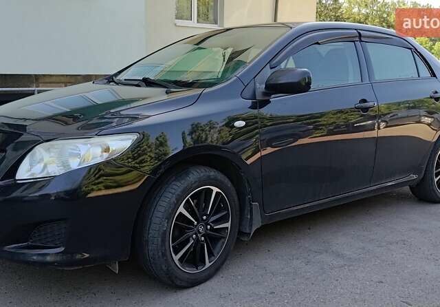 Черный Тойота Королла, объемом двигателя 1.6 л и пробегом 240 тыс. км за 7000 $, фото 1 на Automoto.ua