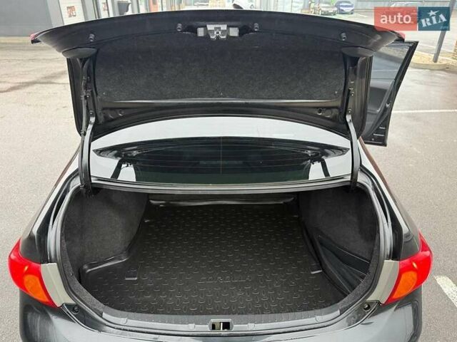 Черный Тойота Королла, объемом двигателя 1.59 л и пробегом 192 тыс. км за 9250 $, фото 30 на Automoto.ua