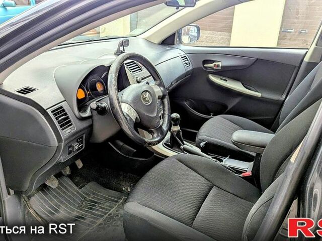 Чорний Тойота Королла, об'ємом двигуна 1.6 л та пробігом 197 тис. км за 6000 $, фото 8 на Automoto.ua