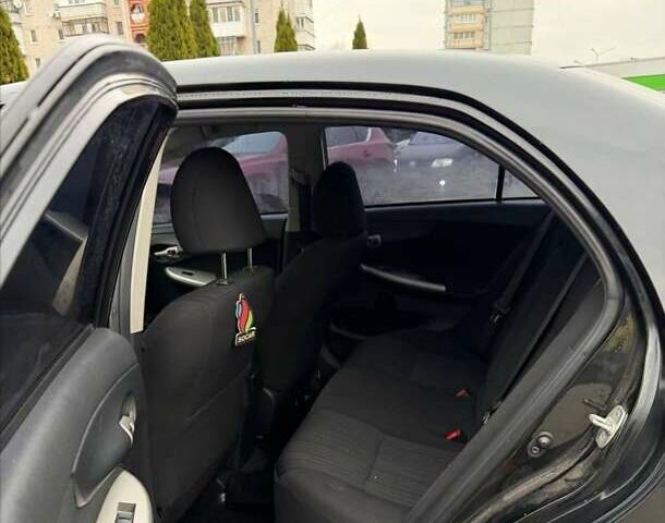 Черный Тойота Королла, объемом двигателя 1.6 л и пробегом 180 тыс. км за 5999 $, фото 23 на Automoto.ua