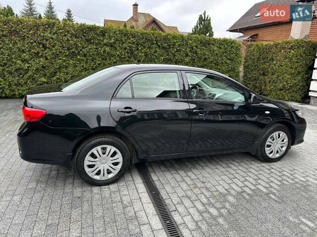 Чорний Тойота Королла, об'ємом двигуна 1.6 л та пробігом 49 тис. км за 9999 $, фото 2 на Automoto.ua