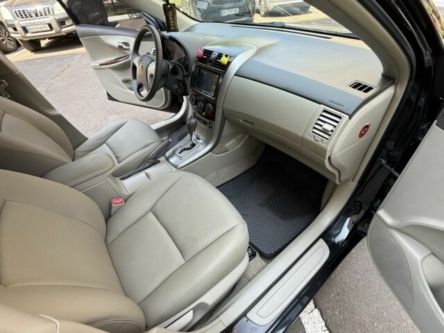 Чорний Тойота Королла, об'ємом двигуна 1.8 л та пробігом 191 тис. км за 7599 $, фото 16 на Automoto.ua