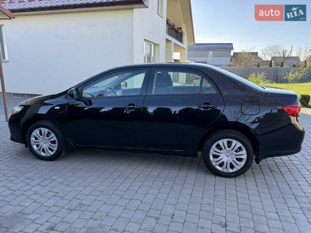 Черный Тойота Королла, объемом двигателя 1.6 л и пробегом 147 тыс. км за 6999 $, фото 5 на Automoto.ua