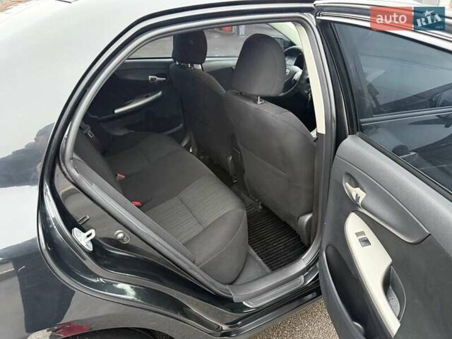 Черный Тойота Королла, объемом двигателя 1.59 л и пробегом 192 тыс. км за 9250 $, фото 24 на Automoto.ua