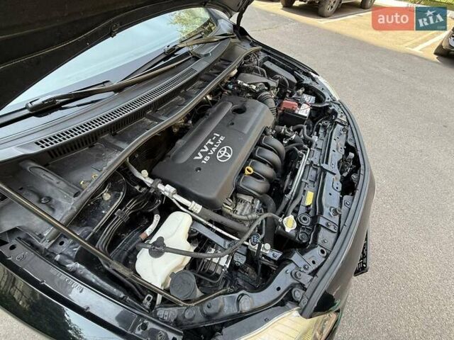 Черный Тойота Королла, объемом двигателя 1.8 л и пробегом 289 тыс. км за 7599 $, фото 15 на Automoto.ua