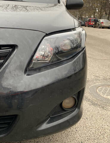 Чорний Тойота Королла, об'ємом двигуна 1.6 л та пробігом 201 тис. км за 7000 $, фото 6 на Automoto.ua