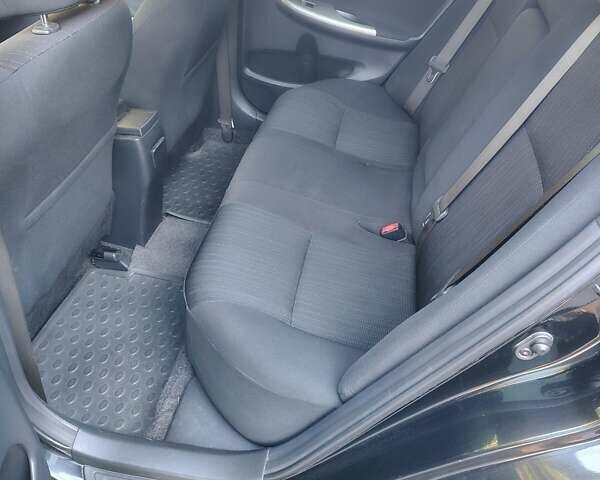 Черный Тойота Королла, объемом двигателя 1.6 л и пробегом 156 тыс. км за 8150 $, фото 4 на Automoto.ua
