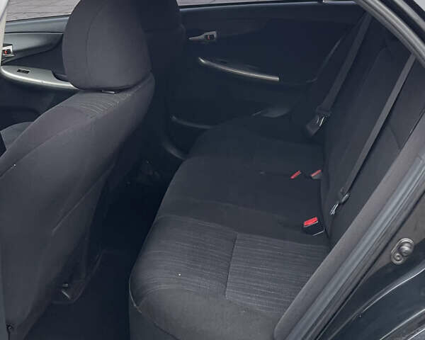 Чорний Тойота Королла, об'ємом двигуна 1.6 л та пробігом 208 тис. км за 7200 $, фото 14 на Automoto.ua