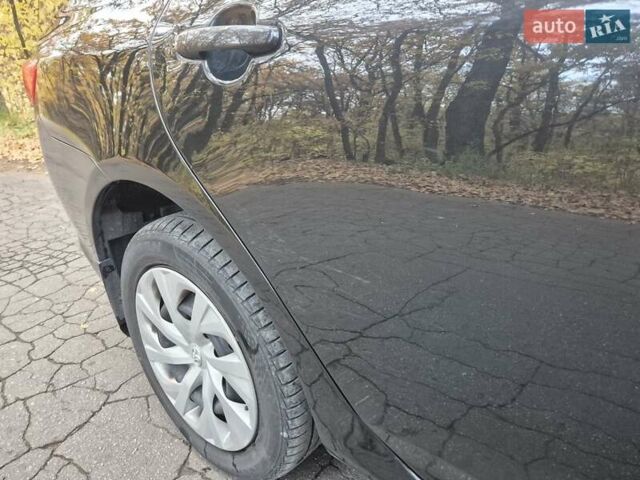Чорний Тойота Королла, об'ємом двигуна 1.6 л та пробігом 212 тис. км за 6700 $, фото 4 на Automoto.ua