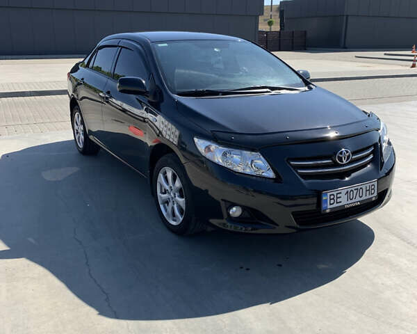 Чорний Тойота Королла, об'ємом двигуна 1.6 л та пробігом 223 тис. км за 7000 $, фото 2 на Automoto.ua