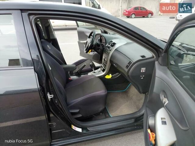 Черный Тойота Королла, объемом двигателя 1.6 л и пробегом 226 тыс. км за 6000 $, фото 11 на Automoto.ua