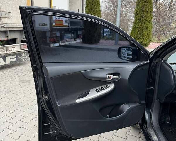 Черный Тойота Королла, объемом двигателя 1.6 л и пробегом 180 тыс. км за 5999 $, фото 18 на Automoto.ua