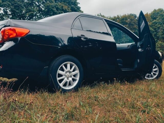 Черный Тойота Королла, объемом двигателя 1.4 л и пробегом 260 тыс. км за 6200 $, фото 2 на Automoto.ua