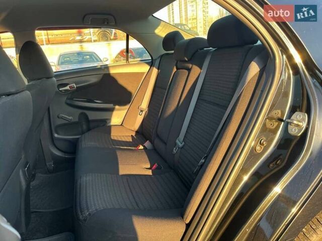 Черный Тойота Королла, объемом двигателя 1.6 л и пробегом 186 тыс. км за 7490 $, фото 8 на Automoto.ua