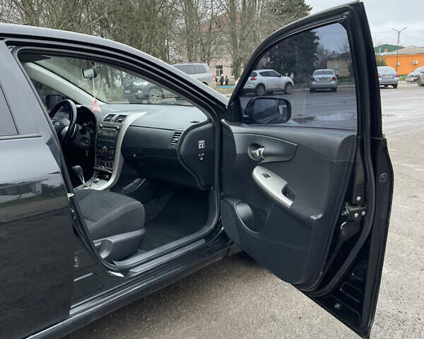 Чорний Тойота Королла, об'ємом двигуна 1.6 л та пробігом 208 тис. км за 7200 $, фото 19 на Automoto.ua