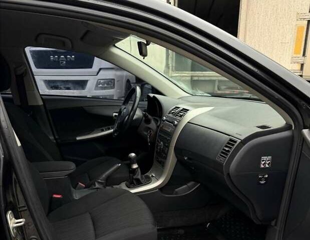 Черный Тойота Королла, объемом двигателя 1.6 л и пробегом 180 тыс. км за 5999 $, фото 20 на Automoto.ua