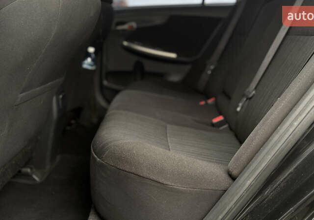 Чорний Тойота Королла, об'ємом двигуна 1.6 л та пробігом 207 тис. км за 6300 $, фото 18 на Automoto.ua