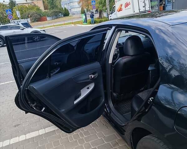 Чорний Тойота Королла, об'ємом двигуна 1.6 л та пробігом 279 тис. км за 7000 $, фото 5 на Automoto.ua