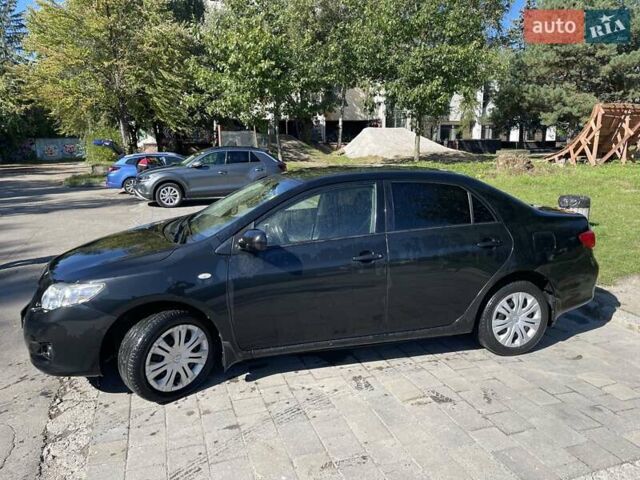 Чорний Тойота Королла, об'ємом двигуна 1.6 л та пробігом 210 тис. км за 6600 $, фото 9 на Automoto.ua