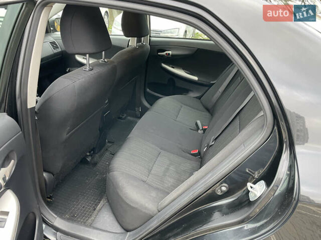 Черный Тойота Королла, объемом двигателя 1.6 л и пробегом 245 тыс. км за 7000 $, фото 5 на Automoto.ua