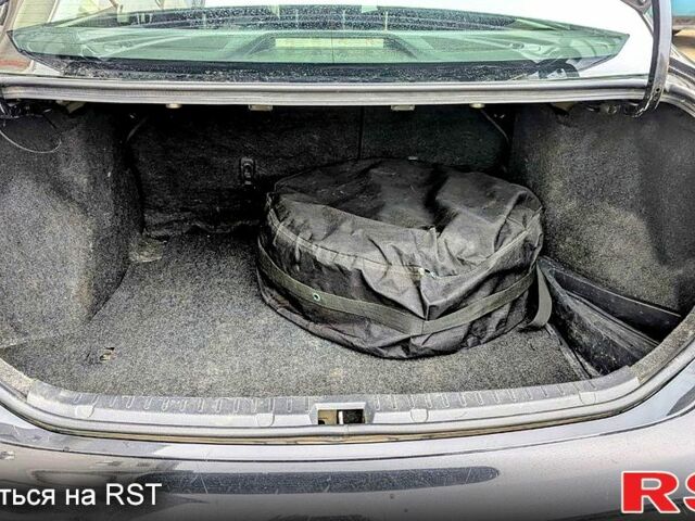Чорний Тойота Королла, об'ємом двигуна 1.6 л та пробігом 197 тис. км за 6000 $, фото 12 на Automoto.ua