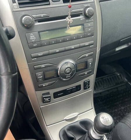 Черный Тойота Королла, объемом двигателя 1.8 л и пробегом 213 тыс. км за 7300 $, фото 19 на Automoto.ua