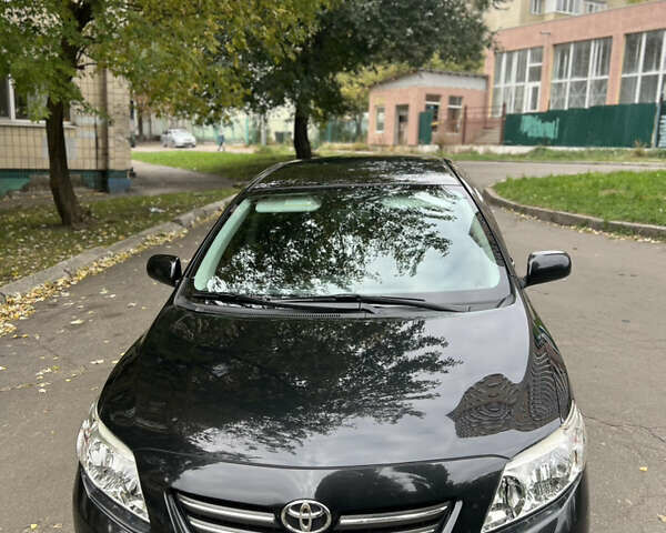 Чорний Тойота Королла, об'ємом двигуна 1.6 л та пробігом 147 тис. км за 7700 $, фото 6 на Automoto.ua