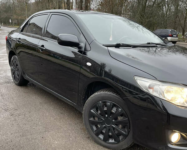 Чорний Тойота Королла, об'ємом двигуна 1.6 л та пробігом 208 тис. км за 7200 $, фото 24 на Automoto.ua