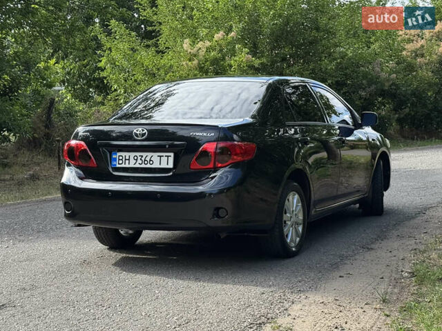Черный Тойота Королла, объемом двигателя 1.6 л и пробегом 191 тыс. км за 7999 $, фото 4 на Automoto.ua