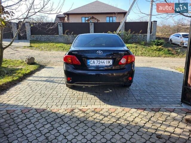 Чорний Тойота Королла, об'ємом двигуна 1.6 л та пробігом 195 тис. км за 8500 $, фото 1 на Automoto.ua