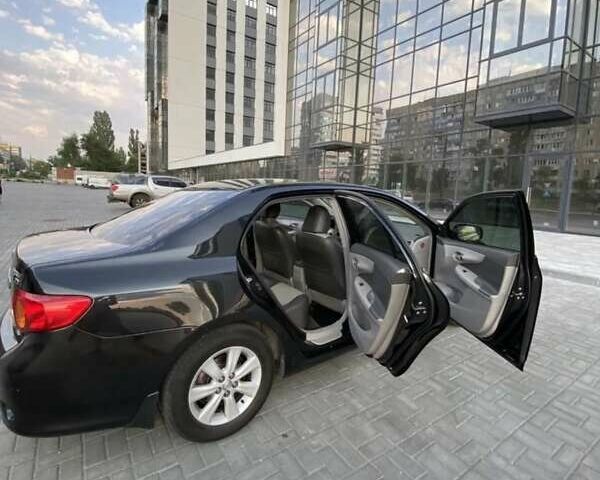 Чорний Тойота Королла, об'ємом двигуна 1.8 л та пробігом 240 тис. км за 7999 $, фото 7 на Automoto.ua