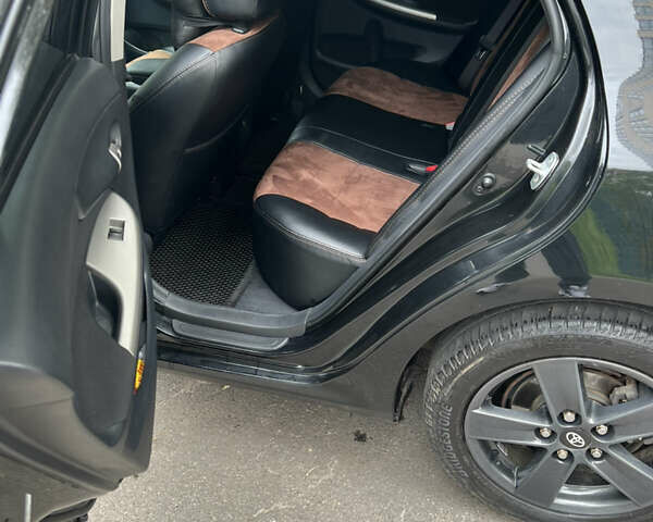 Чорний Тойота Королла, об'ємом двигуна 1.6 л та пробігом 147 тис. км за 7700 $, фото 7 на Automoto.ua