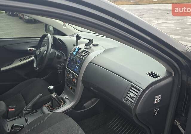 Черный Тойота Королла, объемом двигателя 1.6 л и пробегом 210 тыс. км за 6550 $, фото 8 на Automoto.ua