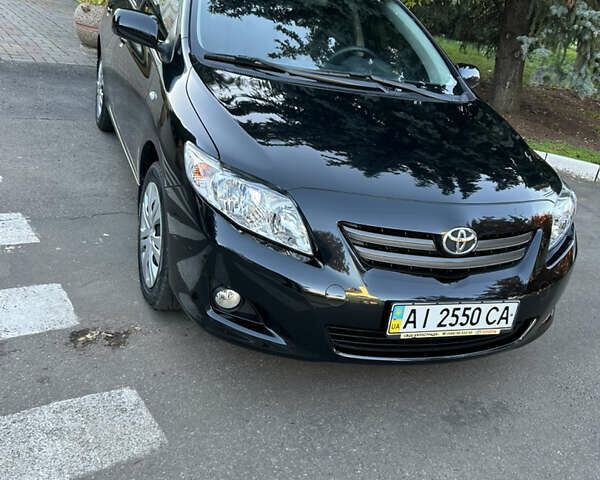 Черный Тойота Королла, объемом двигателя 1.6 л и пробегом 42 тыс. км за 10300 $, фото 2 на Automoto.ua