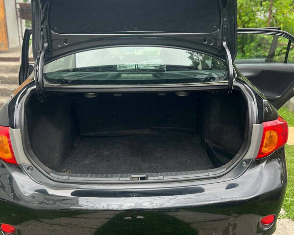 Черный Тойота Королла, объемом двигателя 1.8 л и пробегом 213 тыс. км за 7300 $, фото 20 на Automoto.ua