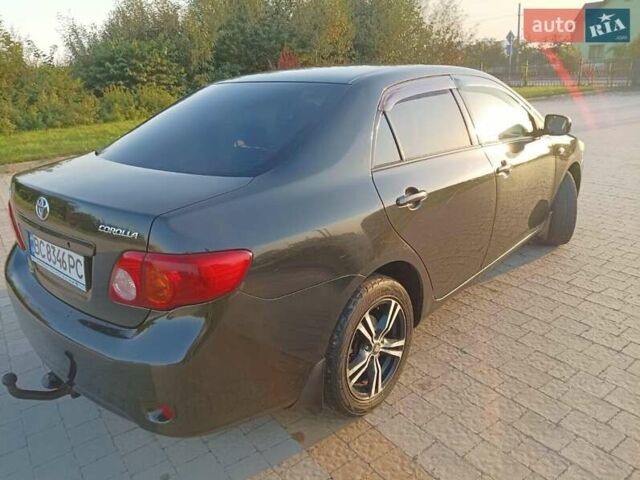 Черный Тойота Королла, объемом двигателя 1.6 л и пробегом 210 тыс. км за 7999 $, фото 4 на Automoto.ua